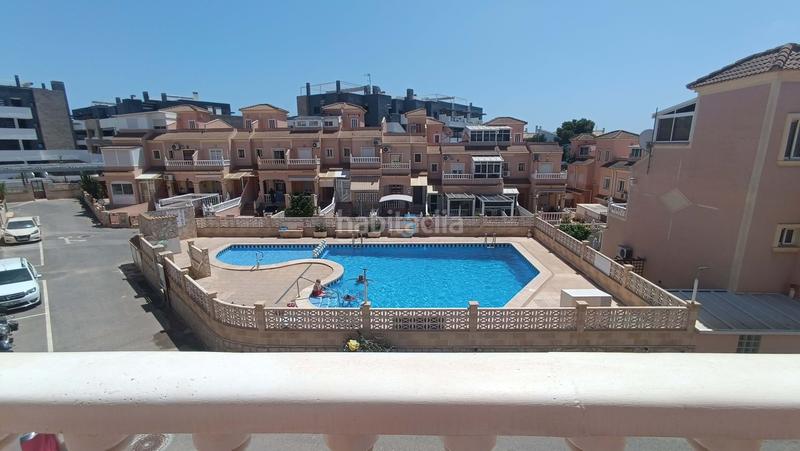 Foto 0a096de6-1696-4d1e-915c-10063b0623bd. Casa adossada amb piscina a Playa Flamenca Orihuela