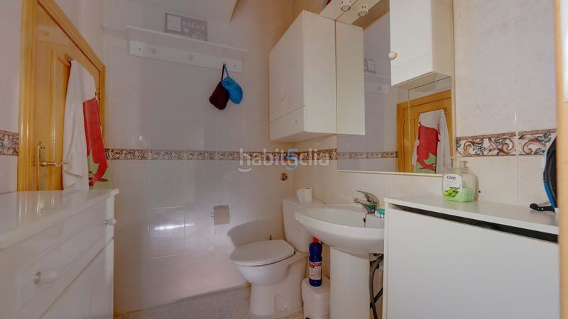 Foto 11ab66bc-174e-414a-a2f9-baa5f6e23abb. Casa adossada amb piscina a Playa Flamenca Orihuela