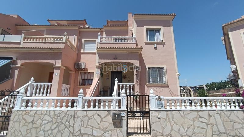 Foto 9ac565f5-8cfb-4acf-b85b-6d997ddff1a3. Casa adossada amb piscina a Playa Flamenca Orihuela