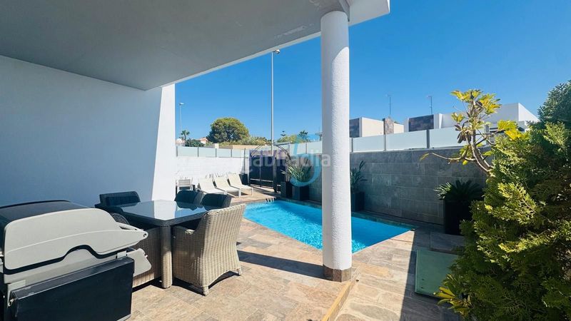 Foto 68a2f8f5-9461-40d4-bcd1-7c4693ad1dd3. Casa amb aparcament piscina a Los Almendros Orihuela