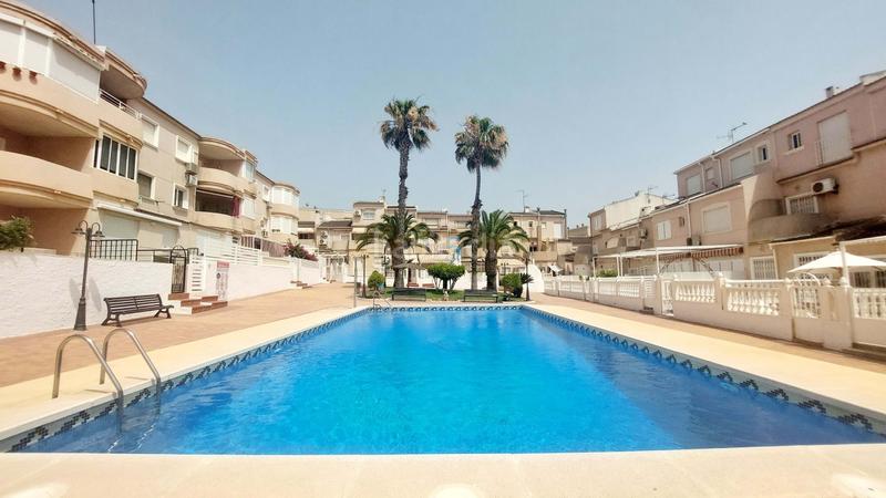 Foto 291cc97e-5ba6-4393-909f-ee022387bfe8. Casa a schiera con piscina in Campoamor Orihuela