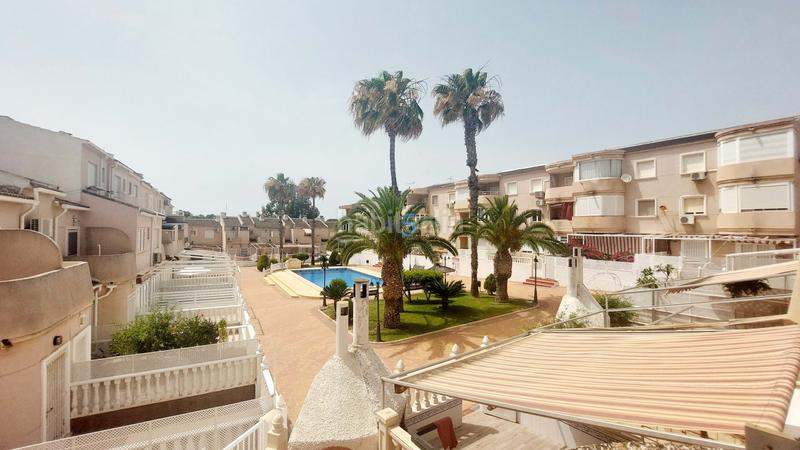 Foto 4b1688a2-b92c-4a09-9854-4dfcfa1214f4. Casa a schiera con piscina in Campoamor Orihuela