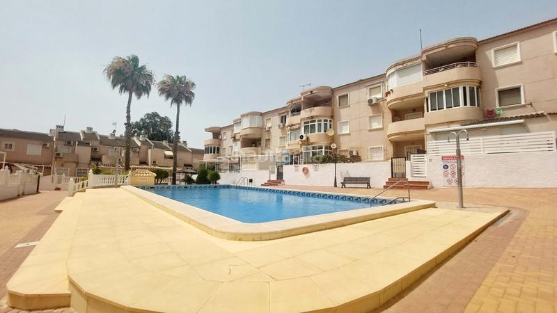 Foto 8228cda2-074c-4f0d-b811-cf775ed4dfdc. Casa a schiera con piscina in Campoamor Orihuela