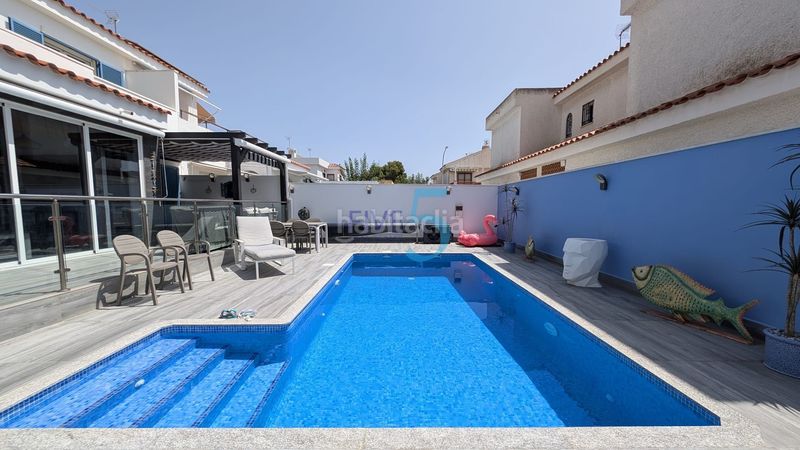 Foto 46b11bbf-ea88-438e-87c3-a5f5c92c5541. Casa amb calefacció aparcament piscina a Campoamor Orihuela