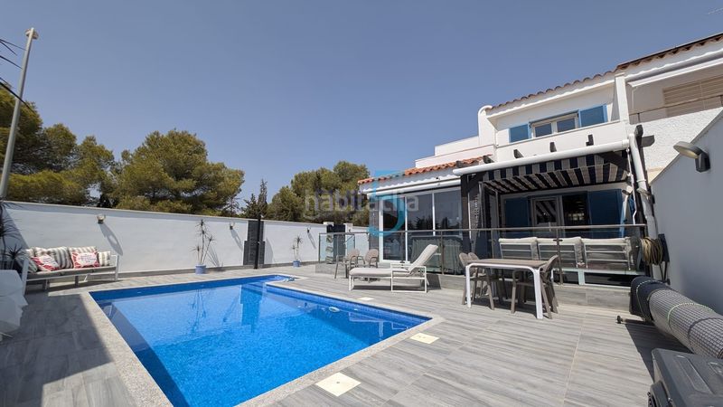Foto 8464199e-4d98-40b6-8149-ad9edda78287. Casa amb calefacció aparcament piscina a Campoamor Orihuela
