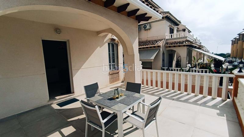 Foto a36d760a-d244-4349-a143-78b631fc879c. Reihenhaus mit pool in Lomas de Cabo Roig - Los Dolses Orihuela