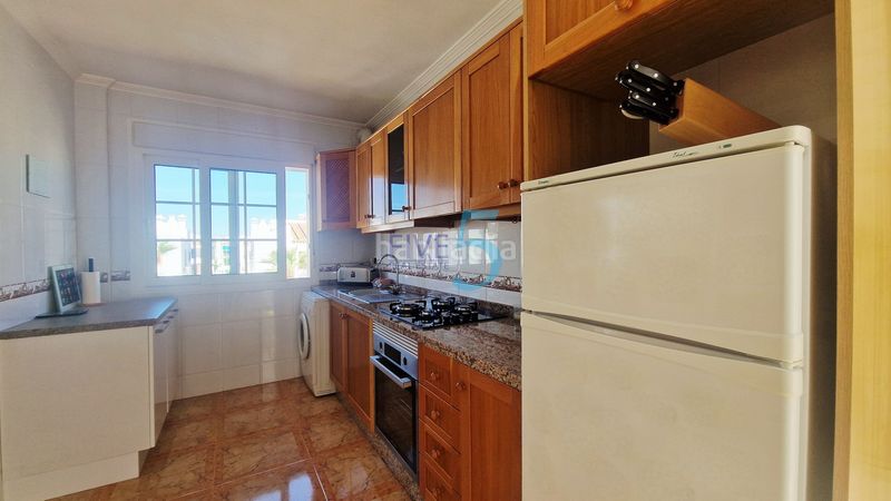 Foto 3f89212c-35df-46fb-942b-26b8478486dc. Piso apartamento superior de 2 dormitorios bellamente presentado en sol golf, villamartín, con piscina común, aparcamiento privado y un en Orihuela