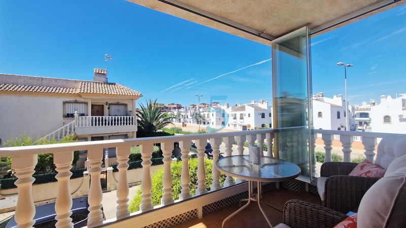 Foto 48e9b687-6151-4cee-9867-e282cd7893a6. Piso apartamento superior de 2 dormitorios bellamente presentado en sol golf, villamartín, con piscina común, aparcamiento privado y un en Orihuela