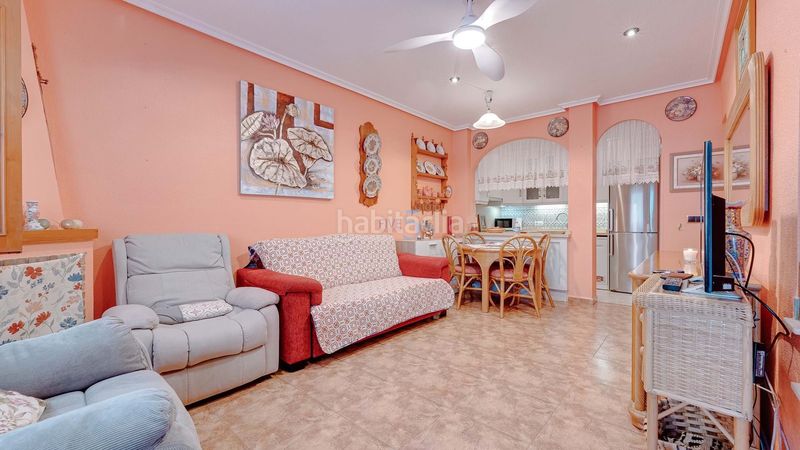 Foto 60ef135e-4684-4658-b27b-4bb5a69145ed. Casa adossada amb calefacció piscina a Playa Flamenca Orihuela