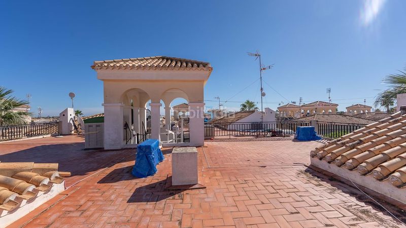Foto 9c98cf25-e5ac-47dc-b8e8-372a63612da2. Casa adossada amb calefacció piscina a Playa Flamenca Orihuela