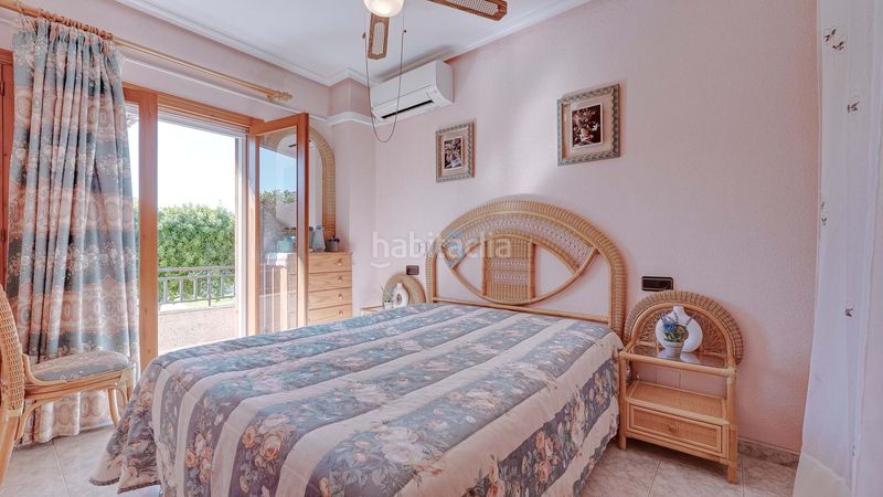 Foto f0df1b3f-cf8e-43a4-8a73-92adf35e8975. Casa adossada amb calefacció piscina a Playa Flamenca Orihuela