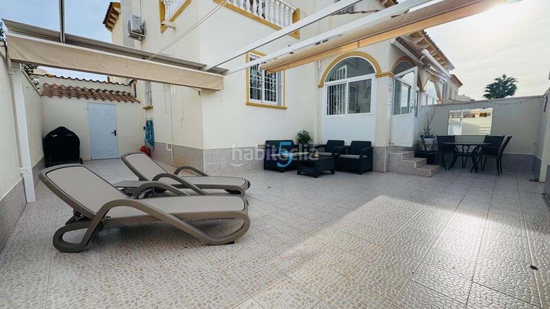 Foto 30568c9d-f0f7-4d57-baf4-3fc84e3a8eb0. Reihenhaus mit pool in Playa Flamenca Orihuela