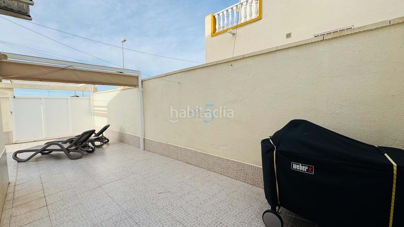 Foto 39b3d759-86c2-4e03-98e9-eba86ddfa902. Reihenhaus mit pool in Playa Flamenca Orihuela