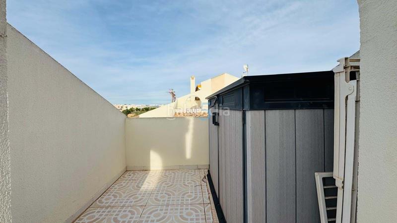 Foto d3ca46fe-68e1-487a-b64b-4cb94096e647. Reihenhaus mit pool in Playa Flamenca Orihuela