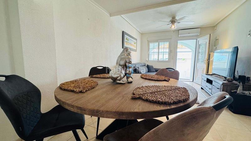 Foto d4080c77-6b87-4a55-bfc1-589dcdbf84ac. Reihenhaus mit pool in Playa Flamenca Orihuela