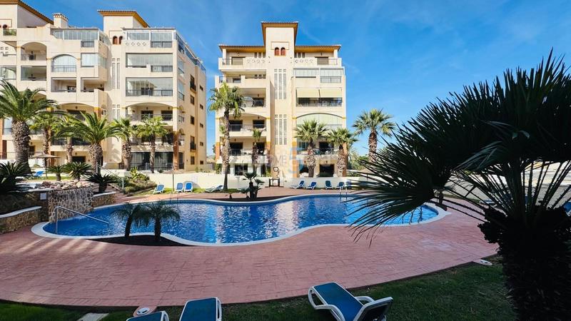 Foto 42b1bcca-e6b9-4f7c-bdbb-a81b852d7f0e. Flat with heating pool in Los Secanos Guardamar del Segura