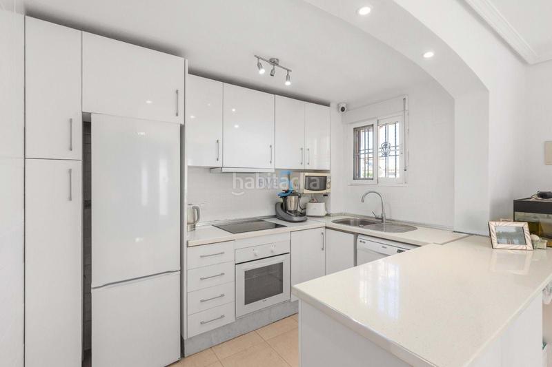 Foto afb51051-c58e-44d6-b7c3-64de536355c3. Maison jumelée avec piscine dans Lomas de Cabo Roig - Los Dolses Orihuela