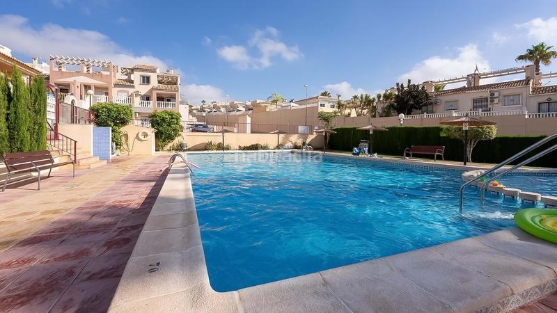 Foto 4524f108-c525-4f6c-a8bf-770cdfa4a8d9. Maison jumelée avec piscine dans Villamartín-Las Filipinas Orihuela