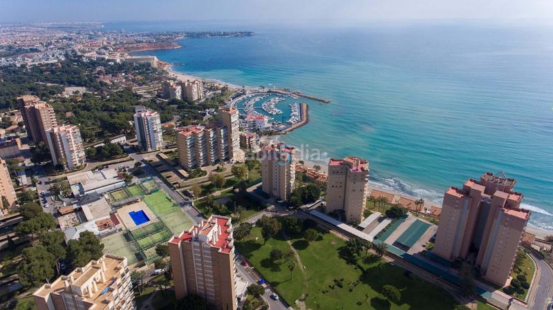 Foto 39d597d0-06d6-46df-837a-08de826db09a. Flat with parking pool in Campoamor Orihuela