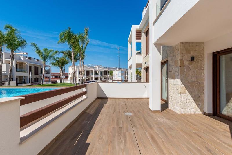 Foto e4f0cd26-b1ec-4db1-849c-9a689c07c1f1. Flat with parking pool in Los Balcones-Los Altos Torrevieja