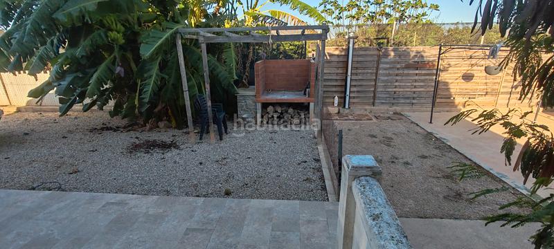 Foto ad2a2fd6-64b0-499d-9237-c34220ca8aec. Casa a n-332 248 a Bulevar del Xúquer Cullera