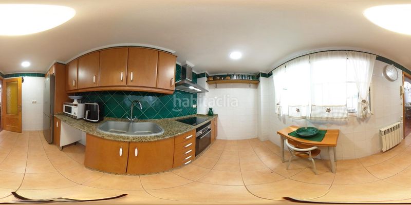 Foto 0c7d6136-2be3-404f-9c03-11caf0462f11. Casa aparellada amb calefacció a playa puerto de Sagunto Sagunt