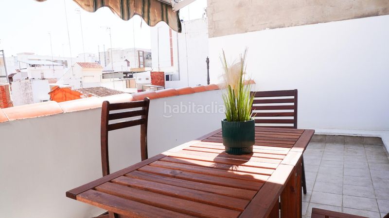 Foto 55bf1e39-9d9c-4f1d-8319-48bb75b3e4ee. Casa aparellada amb calefacció a playa puerto de Sagunto Sagunt