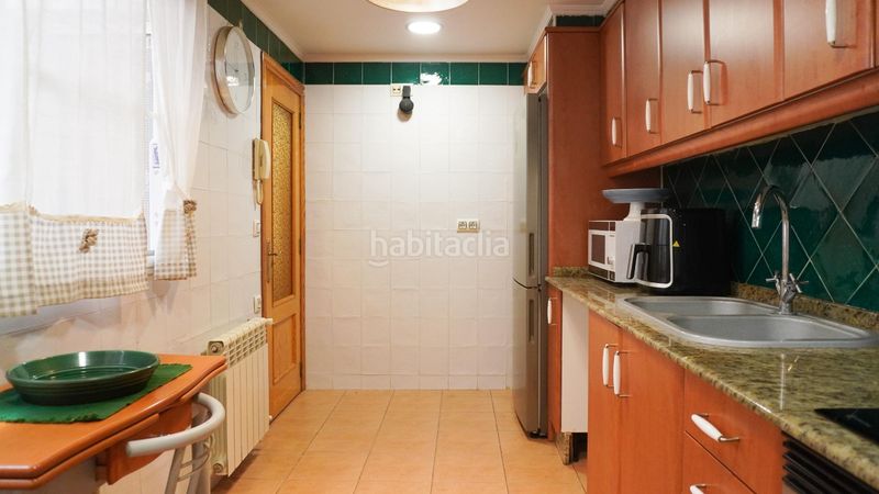 Foto b983a910-4c21-4337-bbd7-dcb7357a4d1e. Casa aparellada amb calefacció a playa puerto de Sagunto Sagunt