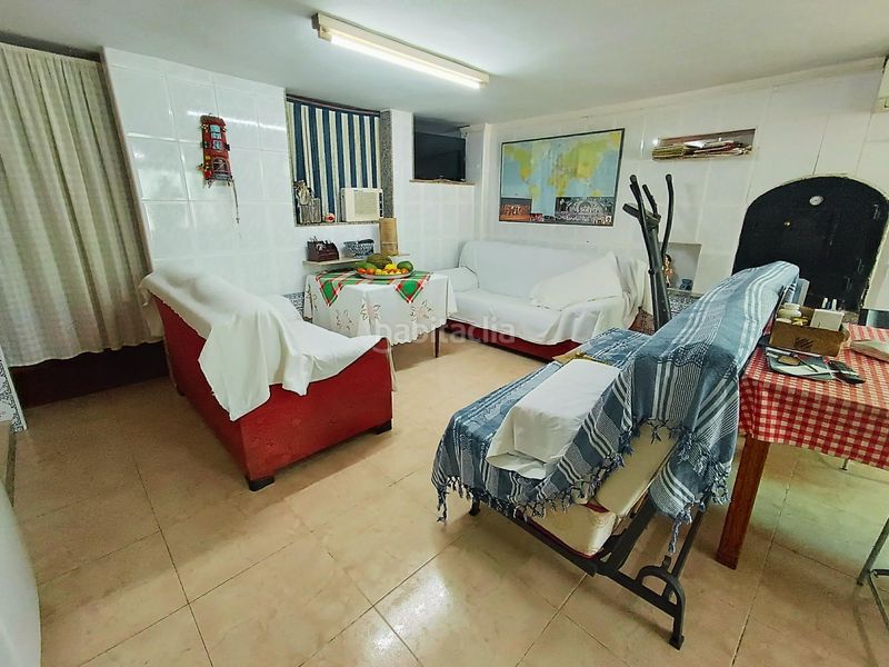 Foto e14bb8fd-6c94-4dbe-a4f9-1e4819e71f86. Casa amb aparcament a Águilas