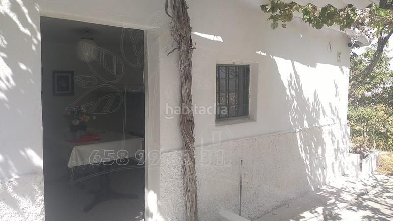 Foto 719bbfa5-d87d-40f0-a94a-e5df9df948c3. Masia amb xemeneia a Baza