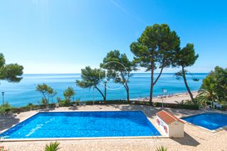 Piccolo appartamento in Passeig marítim 23. Primera línea de mar con licencia turística