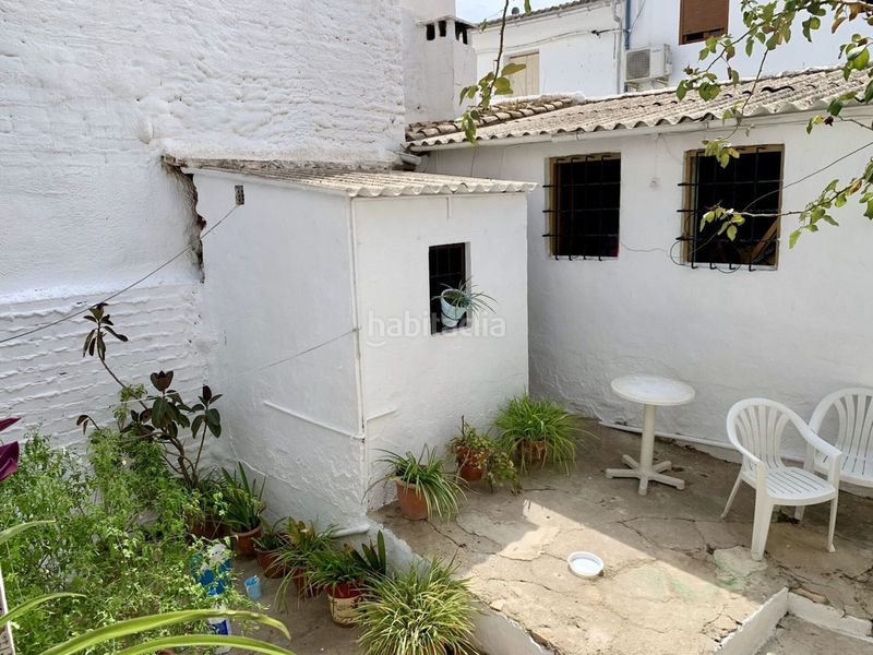 Foto ffbba8f1-b294-4ce4-9eac-429fbd18cbe7. Casa adossada a Iznájar