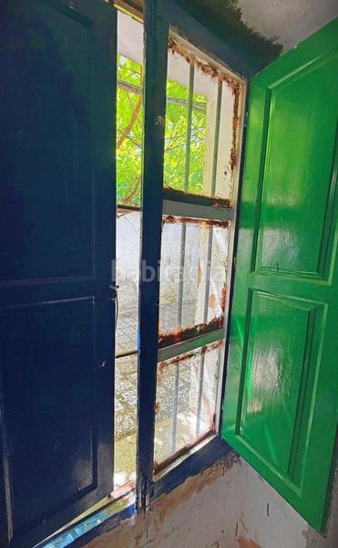 Foto 20fc742f-e304-4617-942e-1cdc52e605c6. Casa adosada en Alfarnate