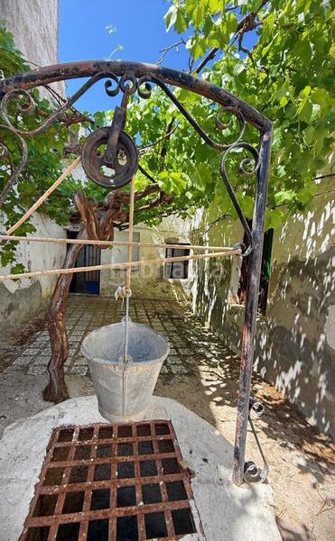 Foto 257ef071-e049-49b9-bf87-71cabf7f4e06. Casa adosada en Alfarnate