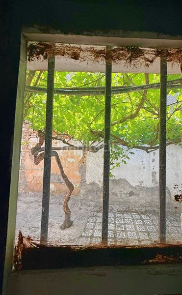 Foto b5dc7824-942c-4c84-bf7f-a8db40005df0. Casa adossada a Alfarnate