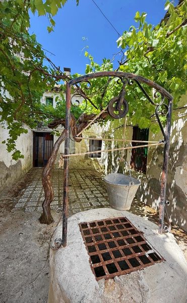 Foto db13ee81-8fe0-41bc-8881-899c0aa5f440. Casa adossada a Alfarnate