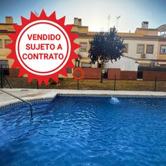 Casa adossada a Fuente de Piedra
