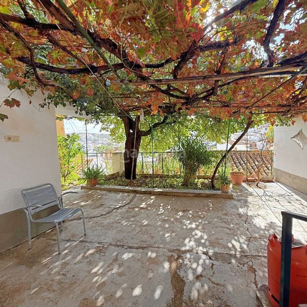 Foto 5d0ecf84-e6c7-4a8c-8603-b61aec139a71. Casa adossada amb aparcament a Iznájar