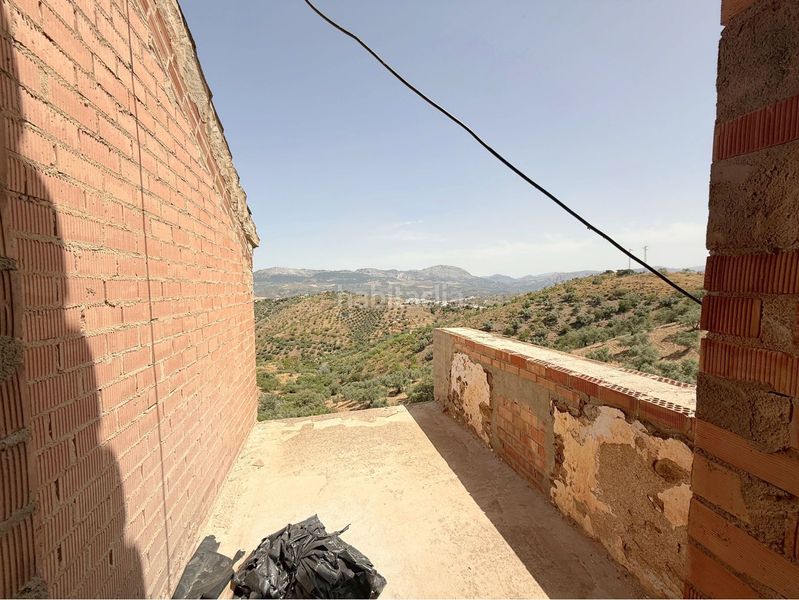 Foto 9f9aeeb2-9634-4c99-aec3-bfc706291ad2. Casa a Colmenar