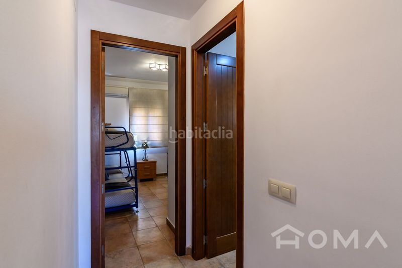 Foto 3559dbf6-8d9b-425f-af52-e25f4f290c4d. Apartament amb calefacció aparcament piscina a Isla Canela Ayamonte