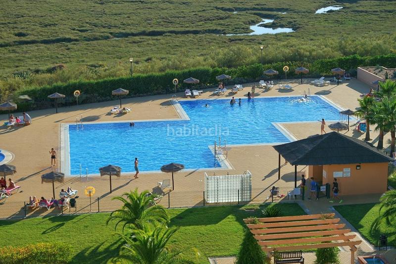 Foto 1ce6b077-d7ae-47cb-b312-60696f74b1af. Appartamento in avenida avda. del real 30 in Isla Canela Ayamonte