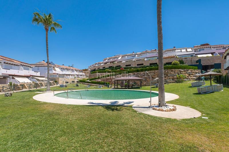 Foto 0bfe55b5-dfe5-4313-8b75-3f964f51233f. Casa adossada a calle equitacion 3 a Hipódromo - Cerrado del Águila Mijas