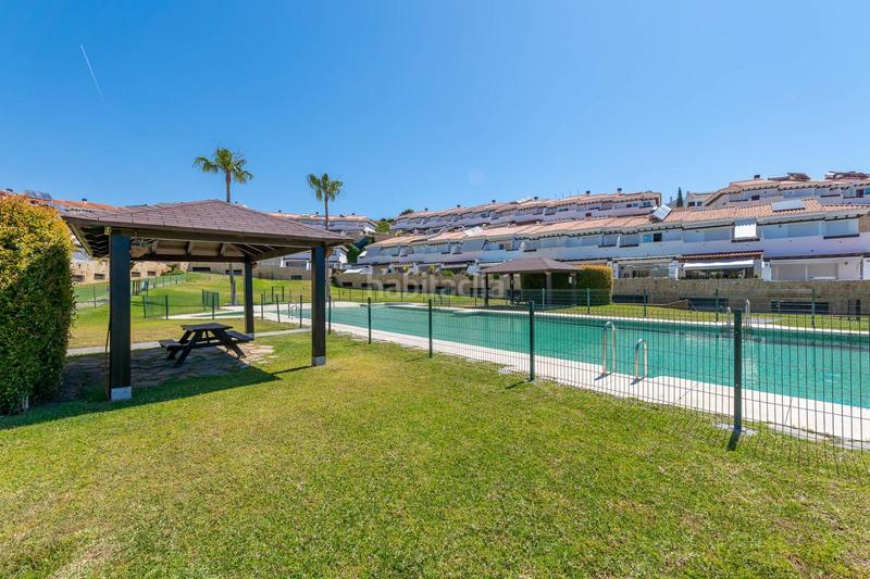 Foto 19f9e97d-a725-4ad8-a429-9a25df31338d. Casa adossada a calle equitacion 3 a Hipódromo - Cerrado del Águila Mijas