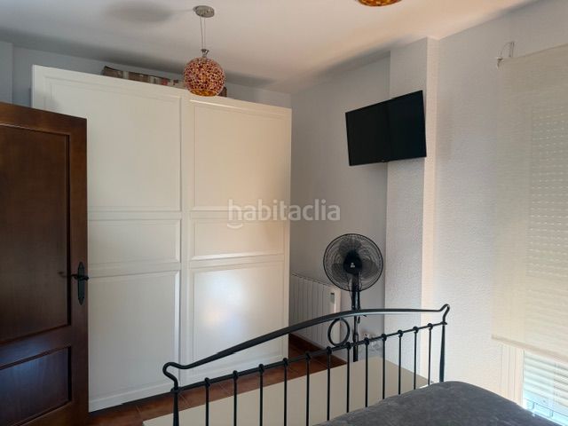 Foto ef7d807c-2eba-44ea-afb7-1b9b0b66c8ed. Casa amb xemeneia calefacció a Benaocaz