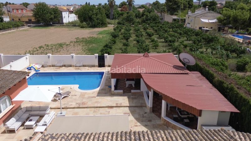 Foto 4521ab8e-7ae4-47bf-8ed0-64992bbd3690. Xalet amb calefacció piscina a Rojales
