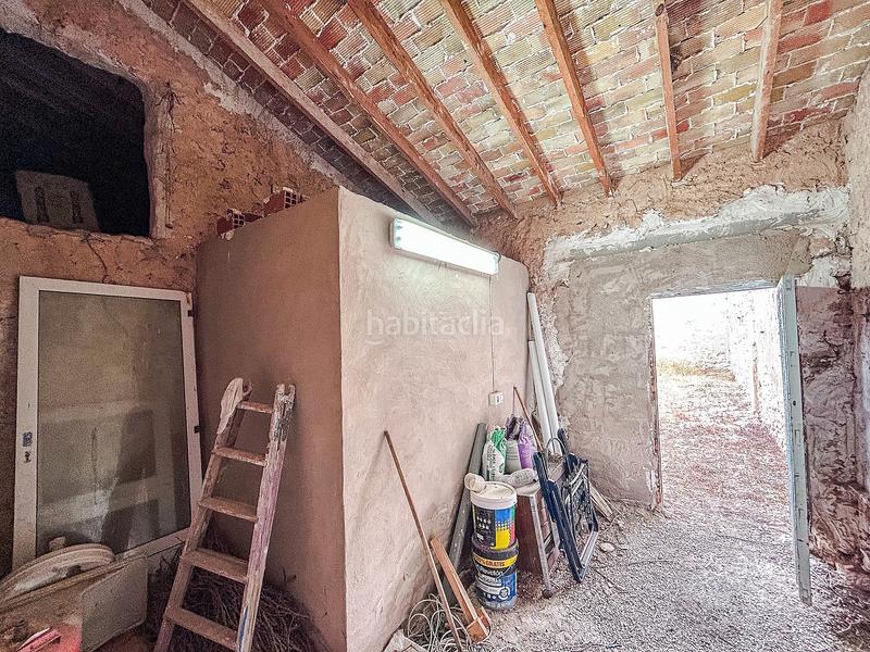 Foto 03c54fb2-e98d-4ca8-bd6d-444ddca040d1. Casa a schiera con camino parcheggio in Abanilla