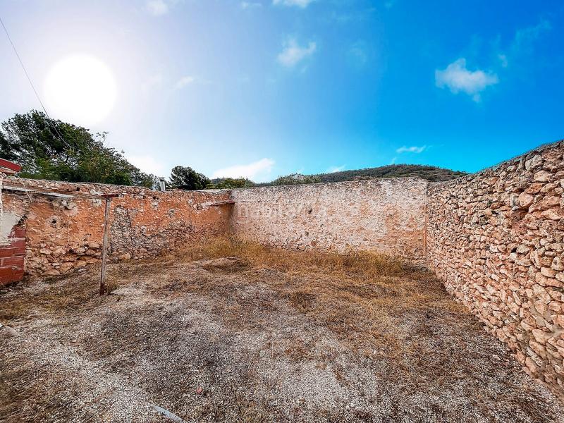 Foto da6ab242-d998-4d10-ad71-9bc175e686e5. Casa a schiera con camino parcheggio in Abanilla