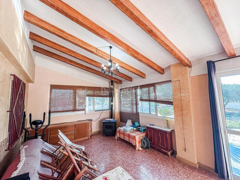 Foto 6960f60d-627e-4f13-bed3-e2c06879db1e. Chalet with fireplace in Monforte del Cid