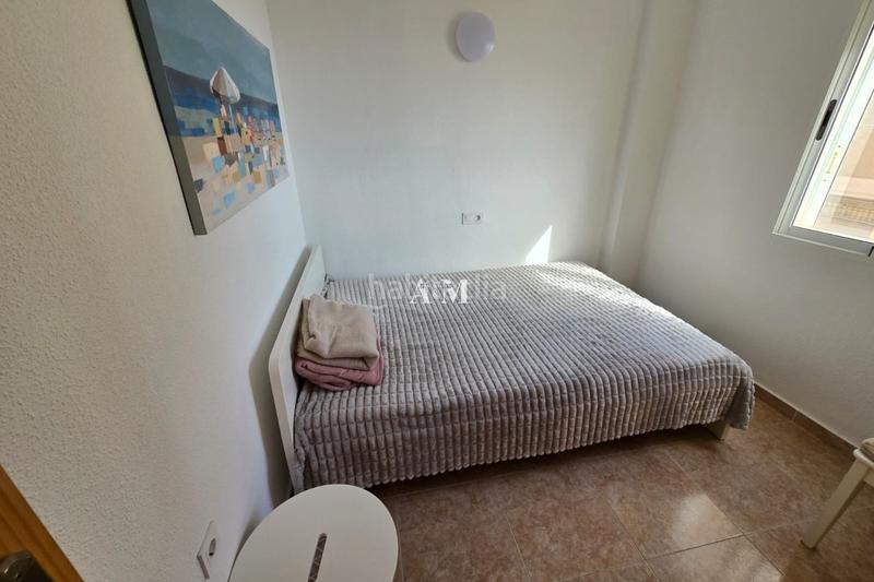 Foto 146c8183-6471-493d-aa9a-b5c1e24d2952. Rent flat with parking pool in Cabo Cervera Torrevieja