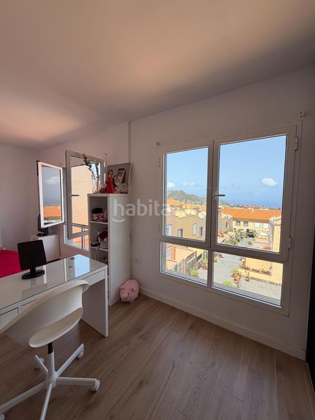 Foto a2f12f20-de50-4e3d-81a1-65deca211093. Casa aparellada amb aparcament a Tegueste